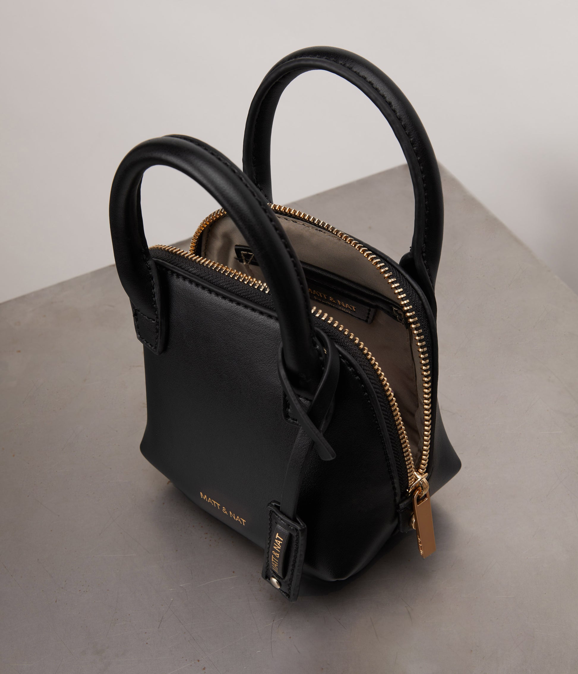 GESSI MICRO Vegan Crossbody Bag - APPLESKIN™ | Color: Black - variant::black